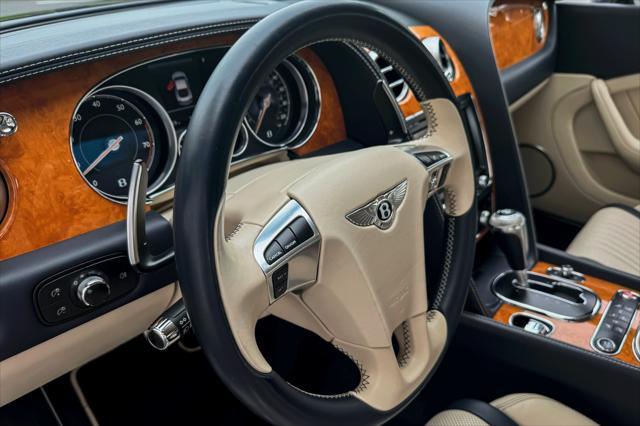 Photo of 2017 Dark Sapphire Metallic Bentley Continental GT