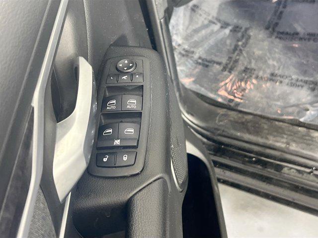 Photo of 2023 Diamond Black Crystal Pearlcoat RAM 1500