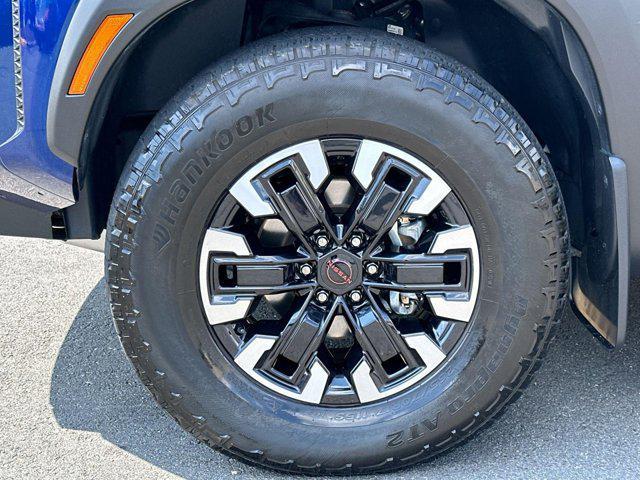Photo of 2023 Deep Blue Pearl Nissan Frontier