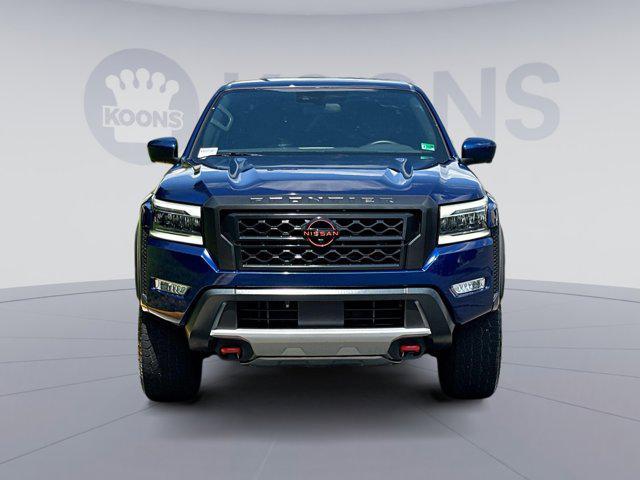Photo of 2023 Deep Blue Pearl Nissan Frontier