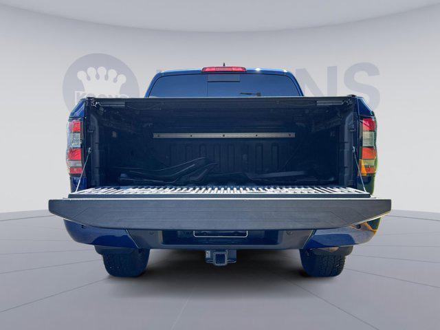 Photo of 2023 Deep Blue Pearl Nissan Frontier