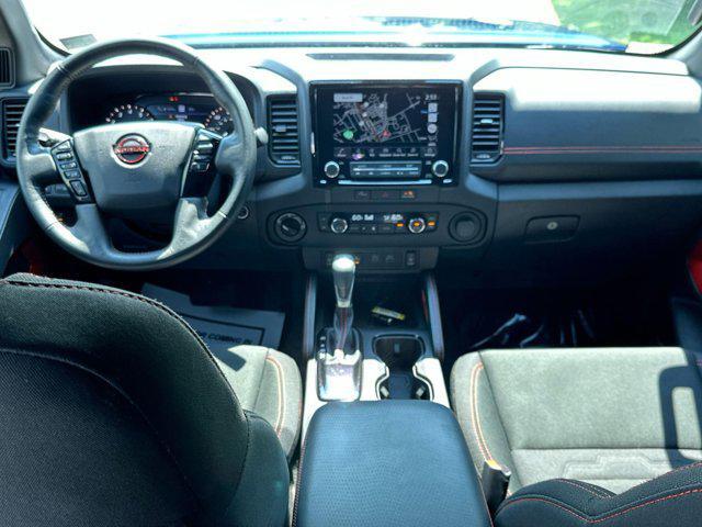 Photo of 2023 Deep Blue Pearl Nissan Frontier