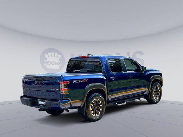 Photo of 2023 Deep Blue Pearl Nissan Frontier