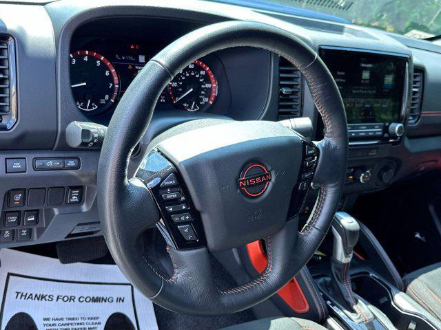 Photo of 2023 Deep Blue Pearl Nissan Frontier