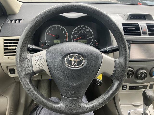 Photo of 2013 Nautical Blue Metallic Toyota Corolla