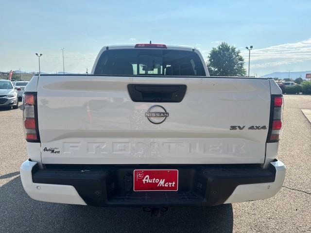 Photo of 2024 Glacier White Nissan Frontier