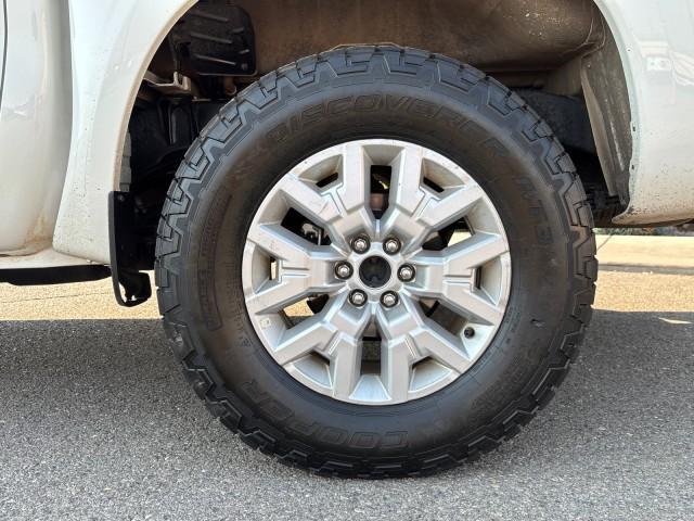 Photo of 2024 Glacier White Nissan Frontier