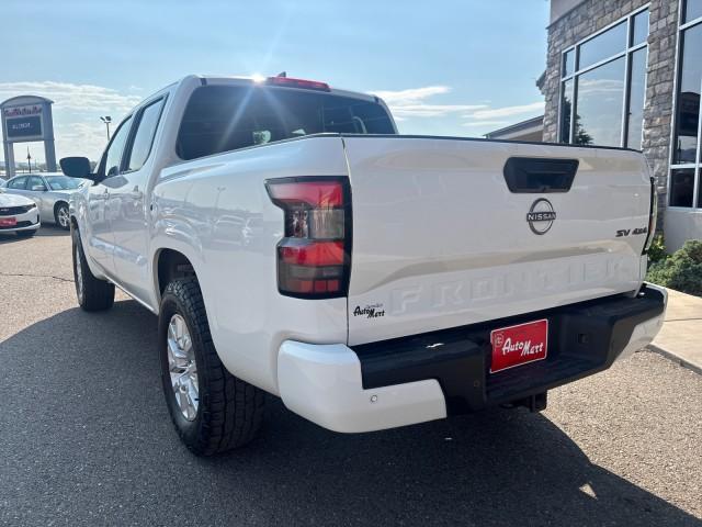 Photo of 2024 Glacier White Nissan Frontier