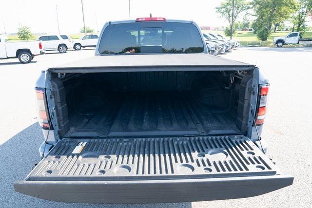 Photo of 2023 Boulder Gray Pearl Nissan Frontier