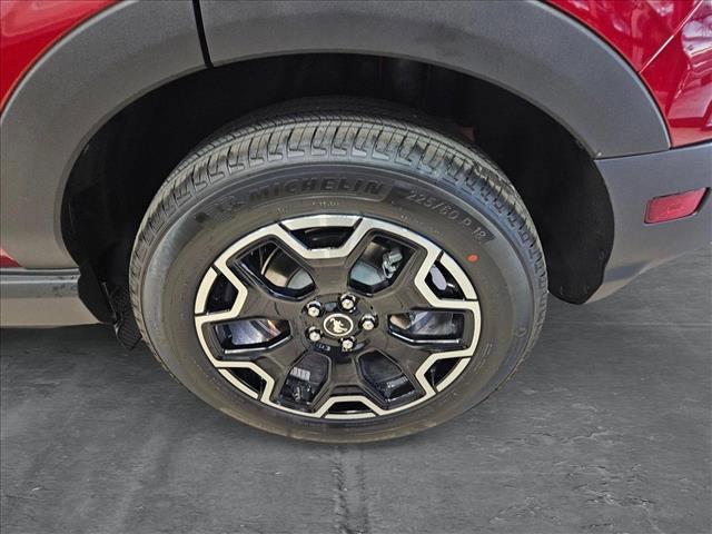 Photo of 2025 Ruby Red Metallic Tinted Clearcoat Ford Bronco Sport