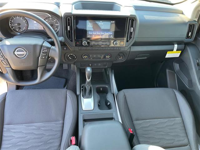 Photo of 2025 Glacier White Nissan Frontier