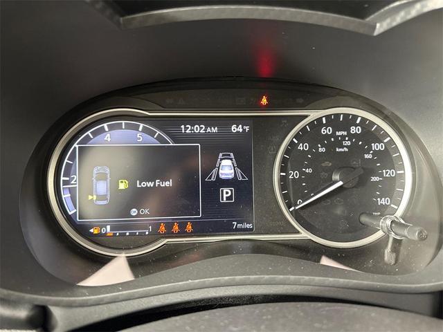 Photo of 2025 Scarlet Ember Tintcoat Nissan Versa