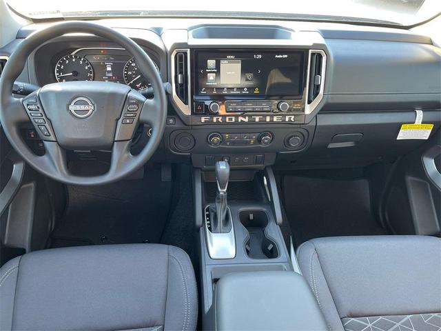 Photo of 2025 Glacier White Nissan Frontier
