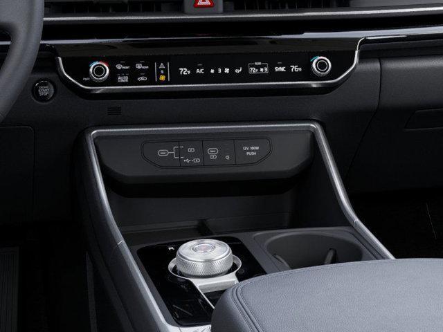 Photo of 2026 Astra Blue Kia Carnival Hybrid