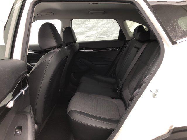 Photo of 2023 Clear White/Black Roof Kia Seltos