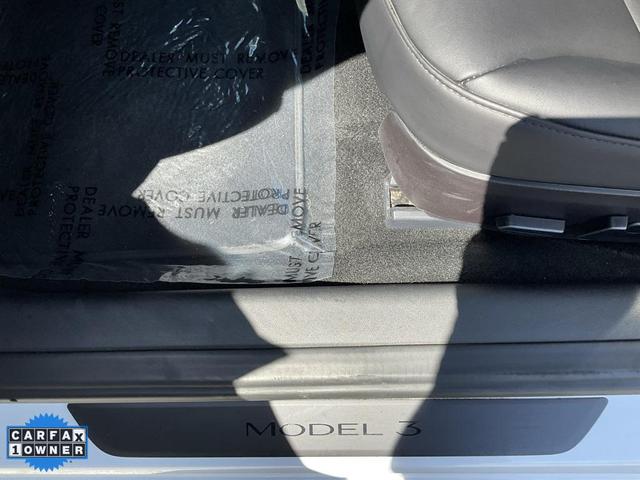 Photo of 2023 Pearl White Multi-Coat Tesla Model 3