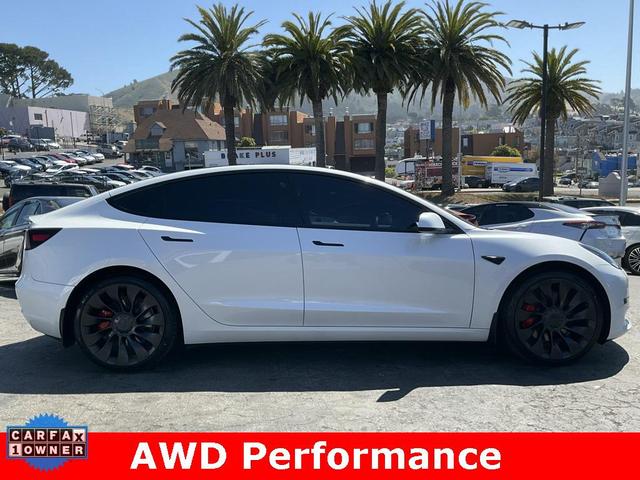 Photo of 2023 Pearl White Multi-Coat Tesla Model 3