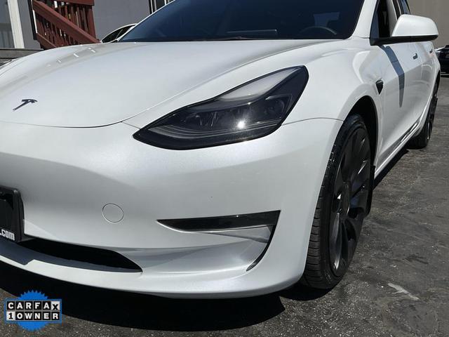 Photo of 2023 Pearl White Multi-Coat Tesla Model 3