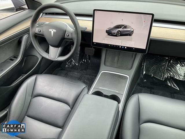 Photo of 2023 Midnight Silver Metallic Tesla Model 3