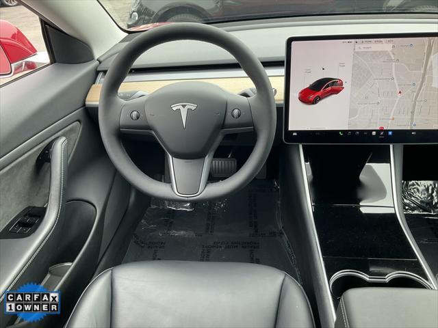 Photo of 2019 Red Multi-Coat Tesla Model 3