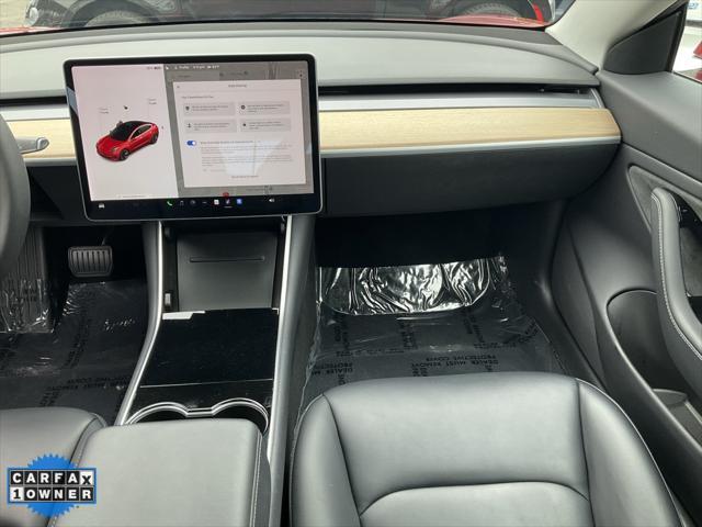 Photo of 2019 Red Multi-Coat Tesla Model 3