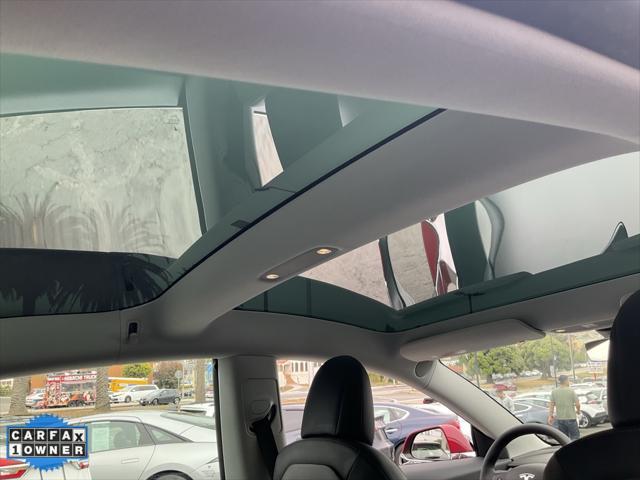 Photo of 2019 Red Multi-Coat Tesla Model 3