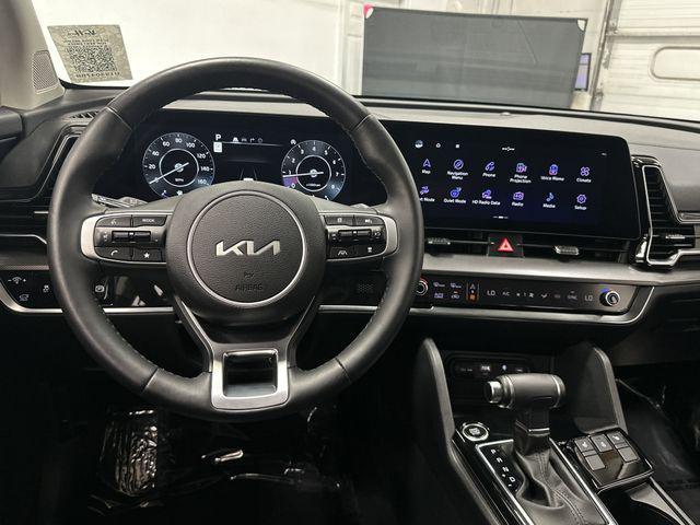 Photo of 2023 Dawning Red Kia Sportage