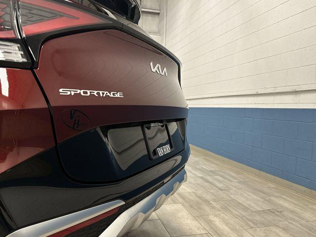 Photo of 2023 Dawning Red Kia Sportage