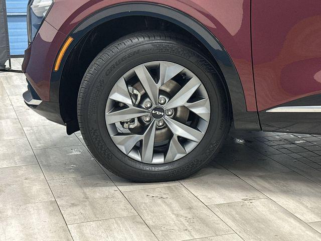 Photo of 2023 Dawning Red Kia Sportage