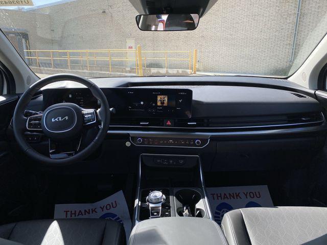 Photo of 2026 Snow White Pearl Kia Carnival Hybrid