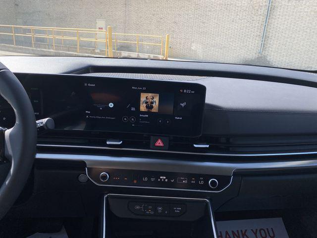 Photo of 2026 Snow White Pearl Kia Carnival Hybrid