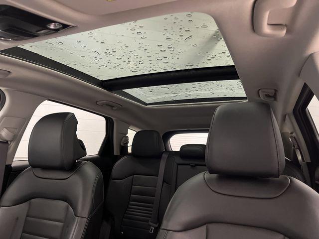 Photo of 2023 Shadow Matte Gray Kia Sportage Hybrid