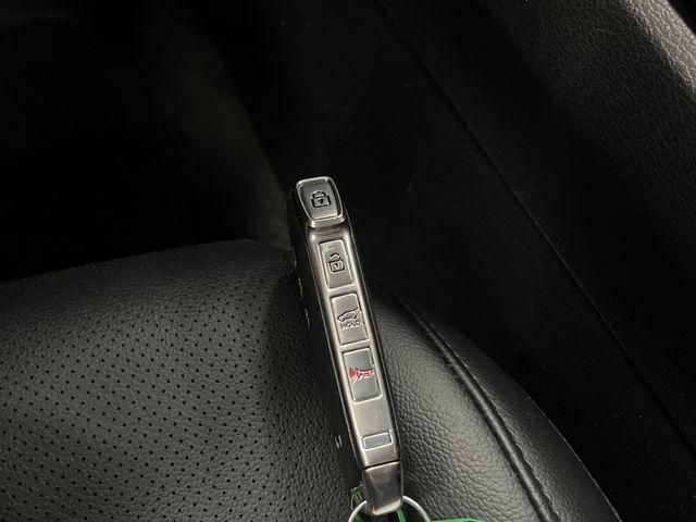 Photo of 2023 Shadow Matte Gray Kia Sportage Hybrid