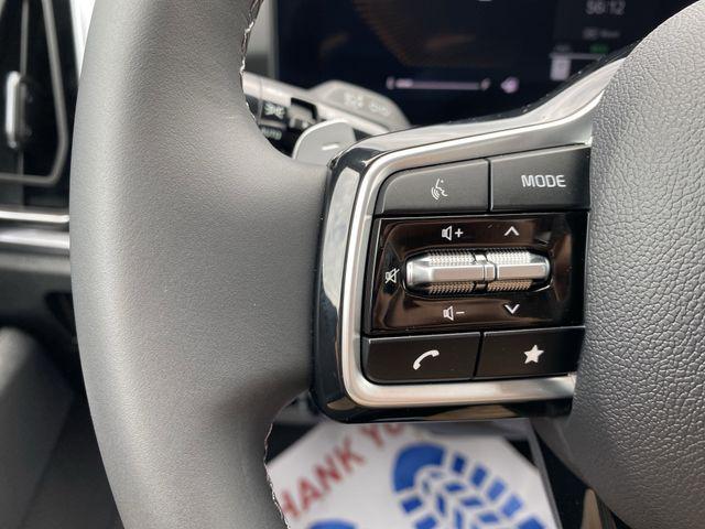 Photo of 2025 Cityscape Green Kia Sorento Hybrid