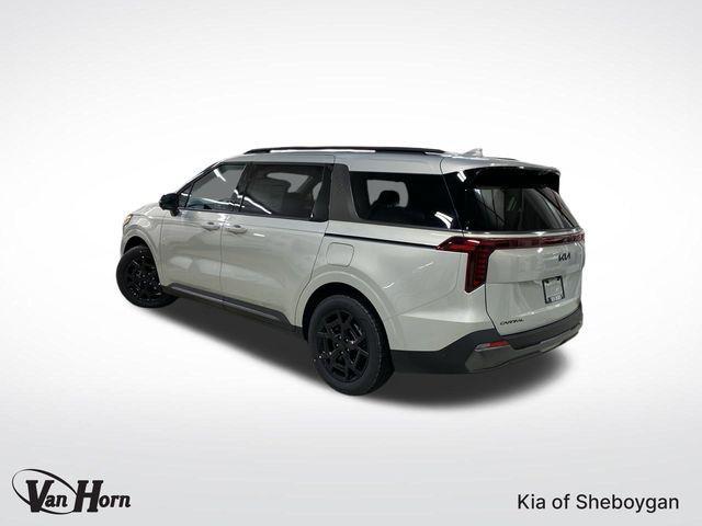 Photo of 2025 Ivory Silver Kia Carnival Hybrid