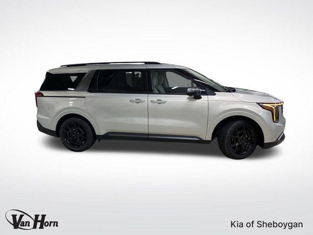 Photo of 2025 Ivory Silver Kia Carnival Hybrid