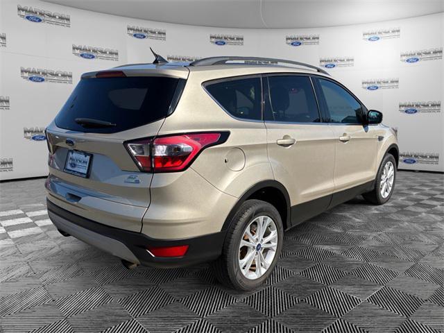 Photo of 2018 White Gold Ford Escape