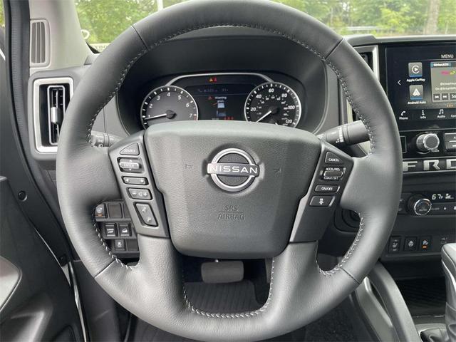Photo of 2025 Glacier White Nissan Frontier