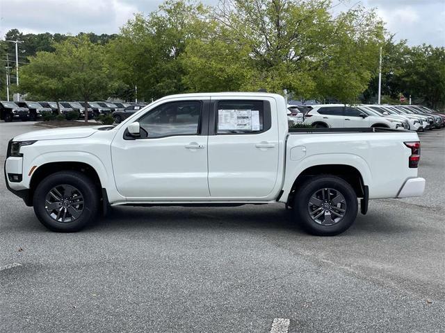 Photo of 2025 Glacier White Nissan Frontier