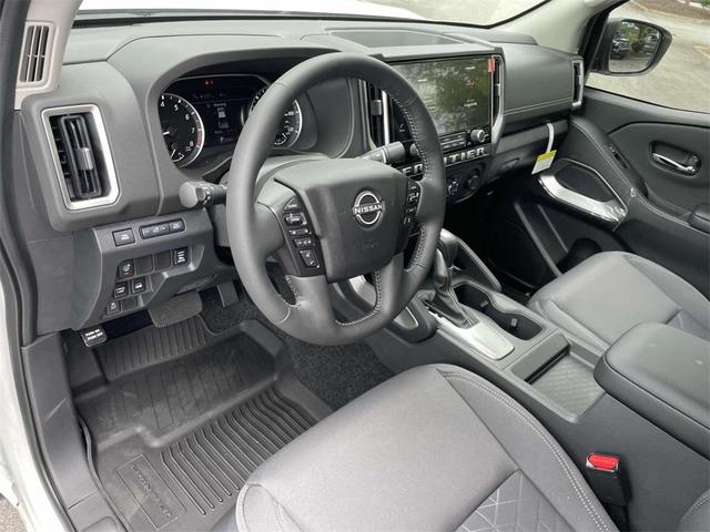 Photo of 2025 Glacier White Nissan Frontier