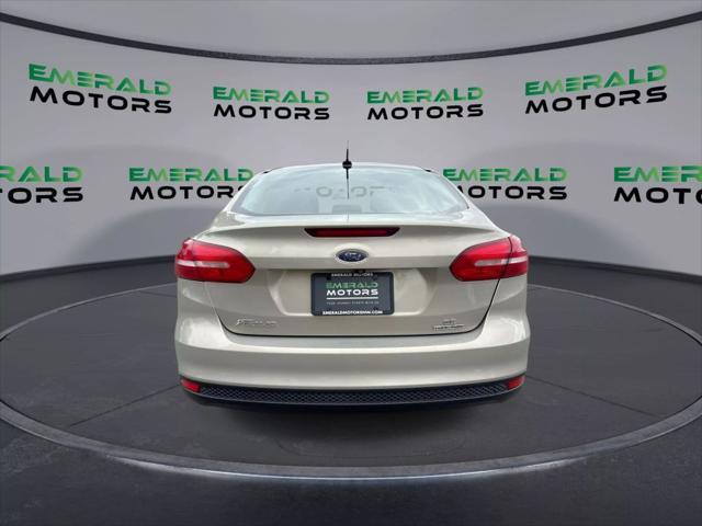 Photo of 2016 Beige Ford Focus