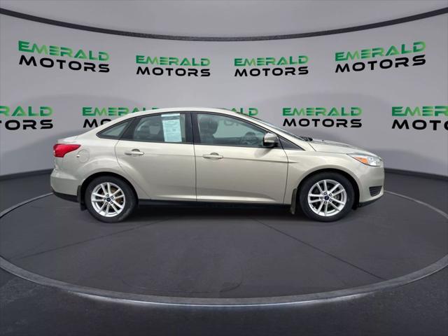 Photo of 2016 Beige Ford Focus