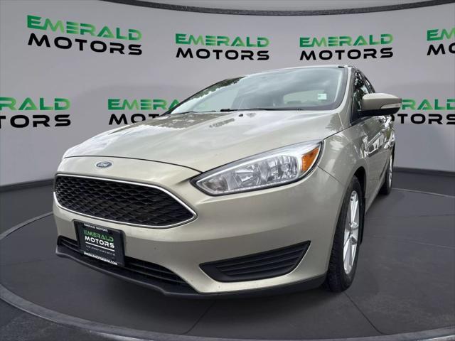Photo of 2016 Beige Ford Focus