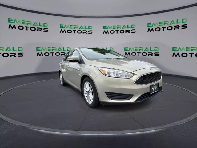 Photo of 2016 Beige Ford Focus
