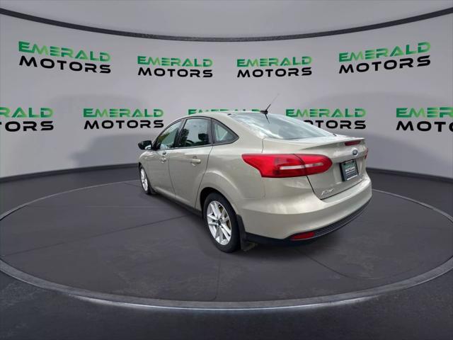 Photo of 2016 Beige Ford Focus