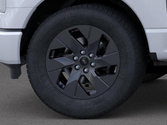 Photo of 2025 Space White Metallic Ford F-150 Lightning