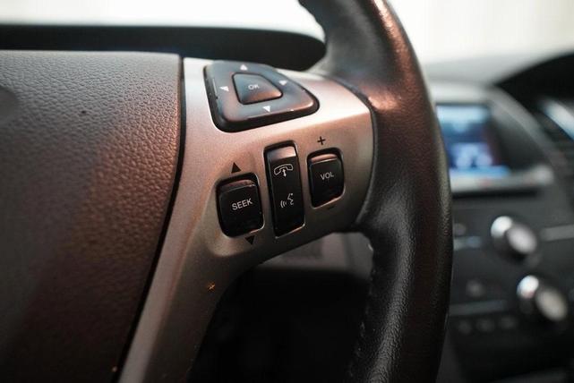 Photo of 2015 Magnetic Metallic Ford Taurus
