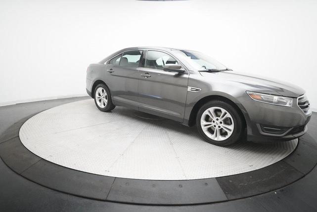 Photo of 2015 Magnetic Metallic Ford Taurus