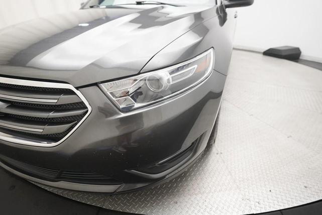 Photo of 2015 Magnetic Metallic Ford Taurus