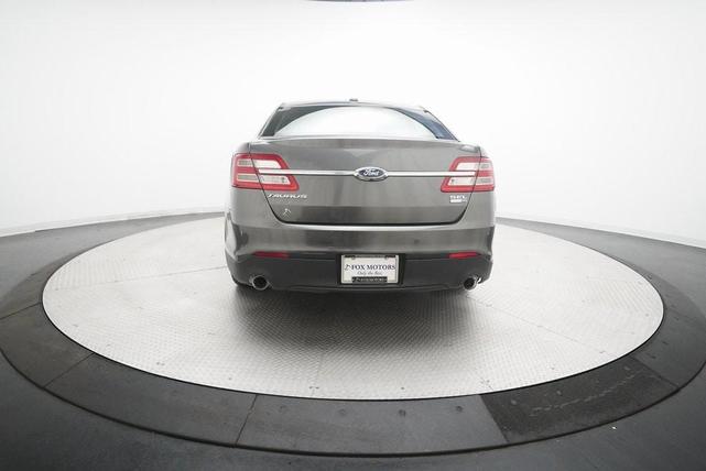 Photo of 2015 Magnetic Metallic Ford Taurus